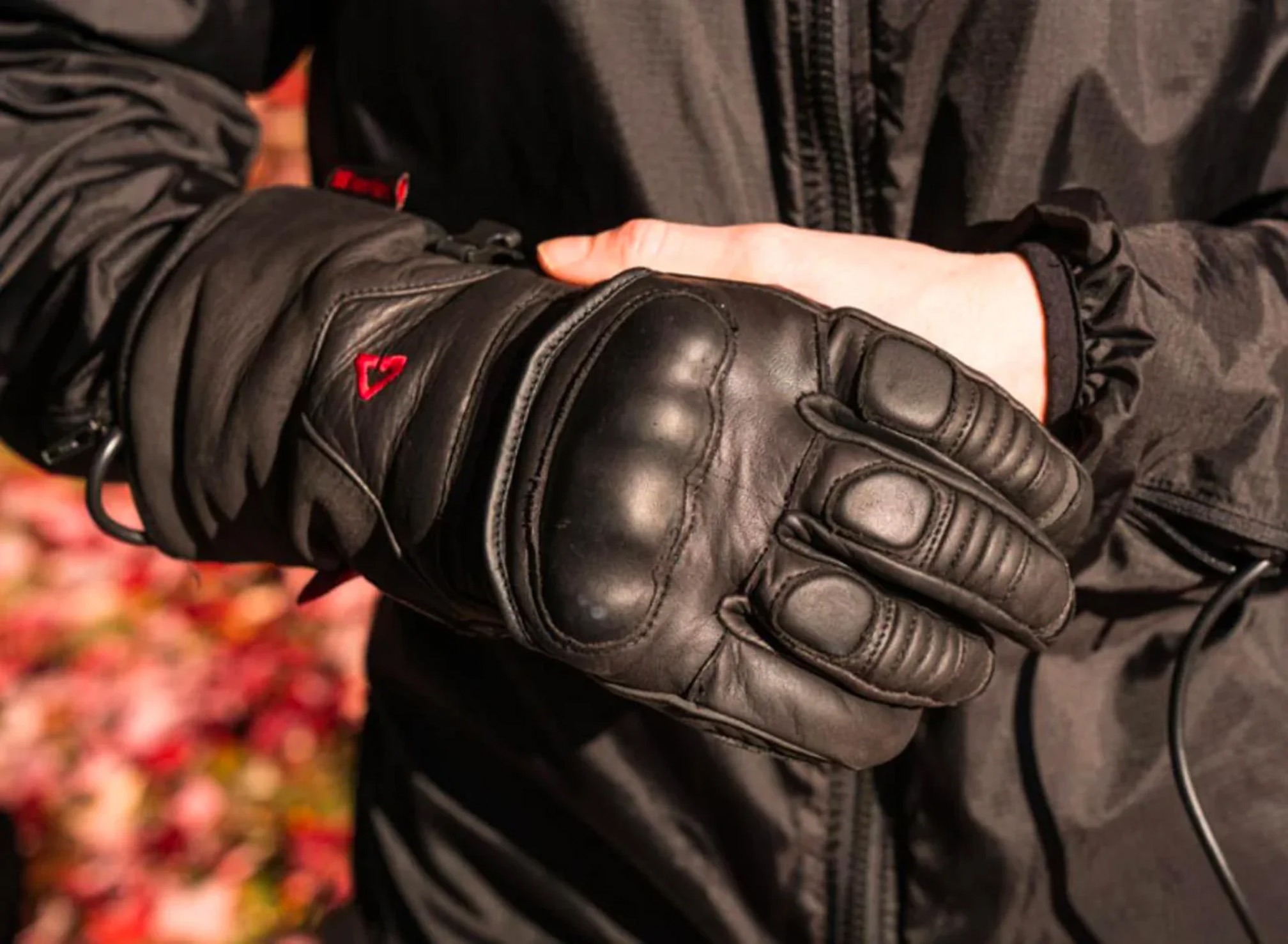 Close-Up of Rider putting on GERBING 12V Vanguard Heated Gloves