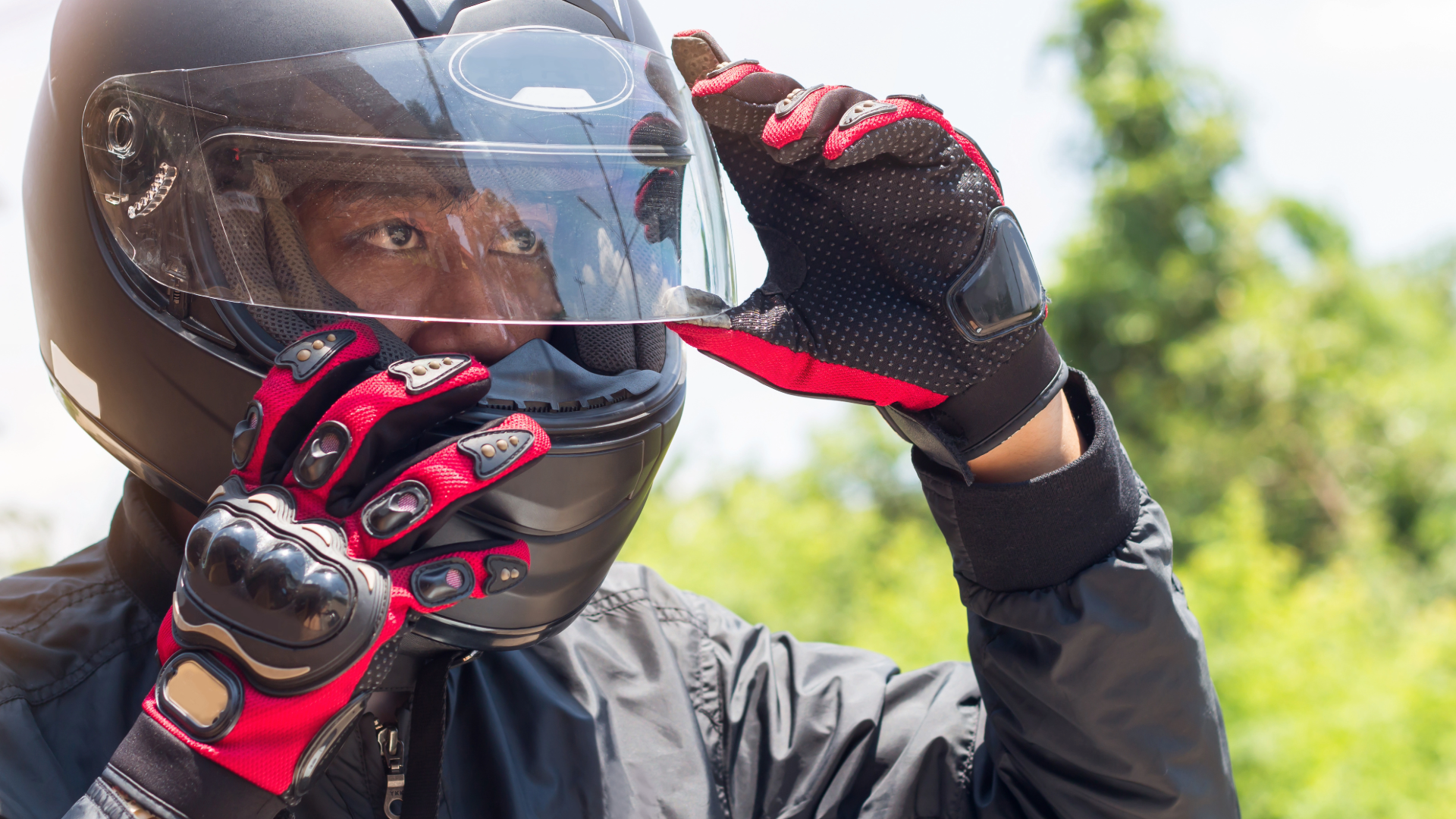 Full motorcycle riding gear including helmet, jacket, gloves for spring season