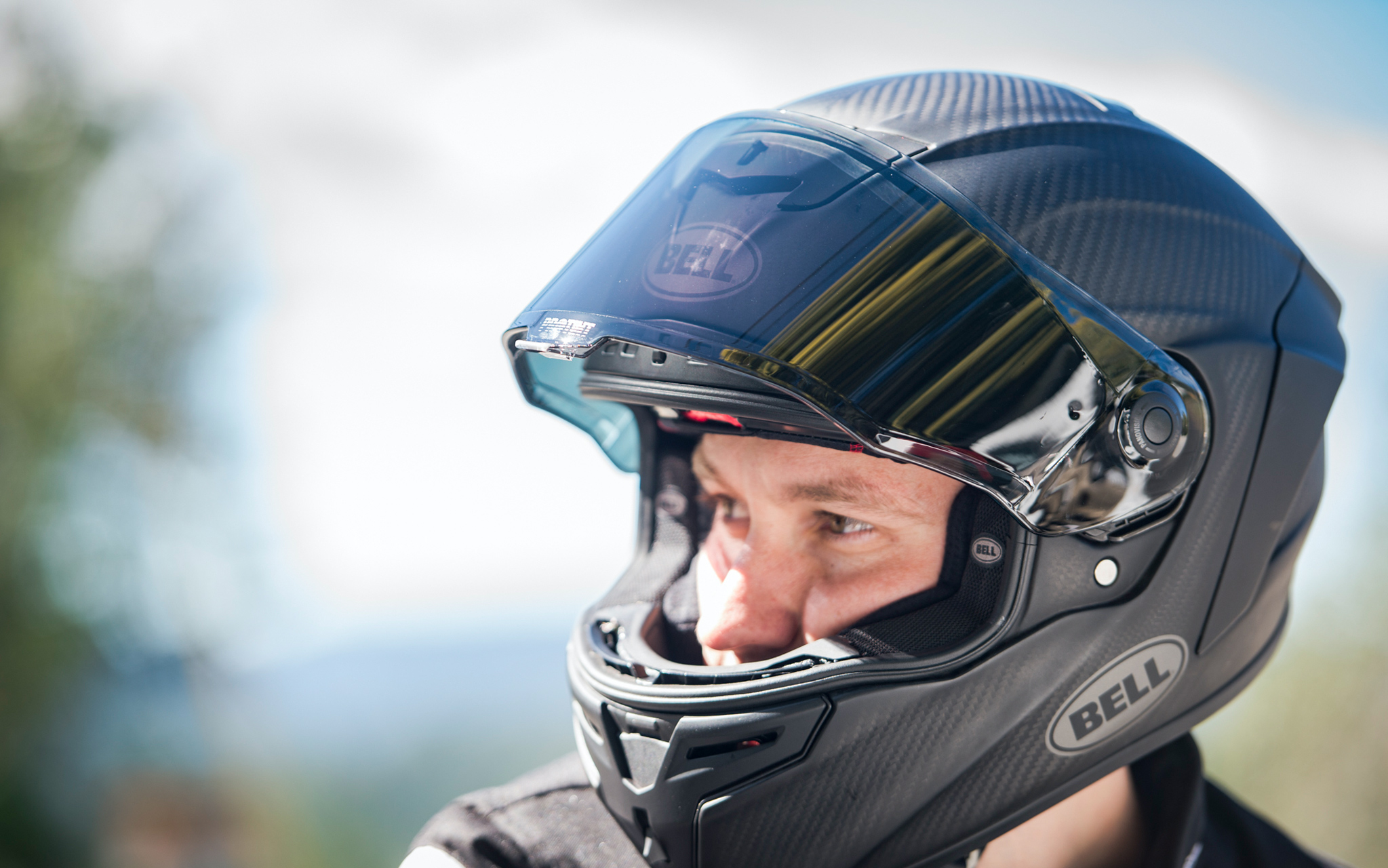 Close up of rider in well-fitting carbon Bell Racestar Helmet