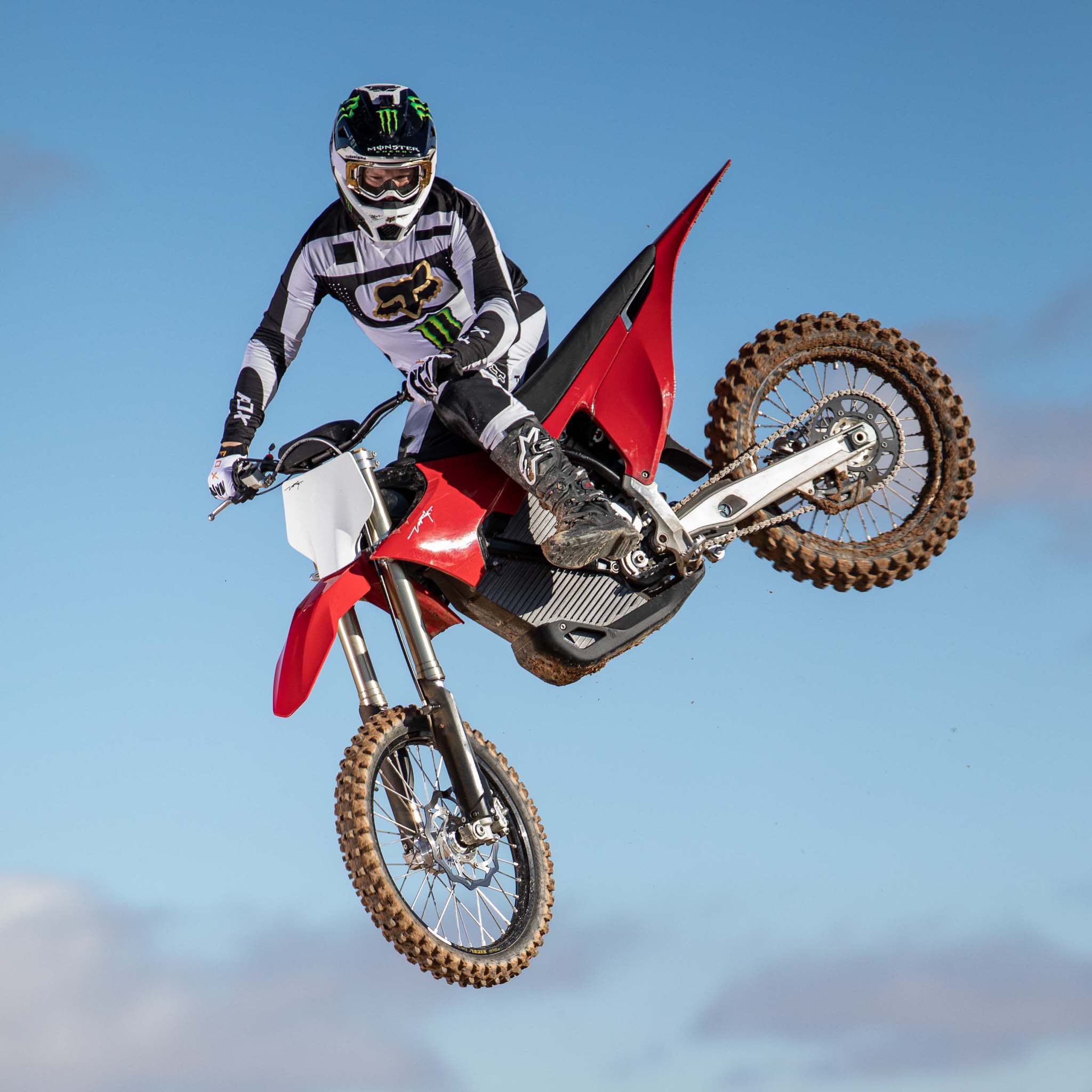 Close up of rider on electric Stark Varg mid-jump