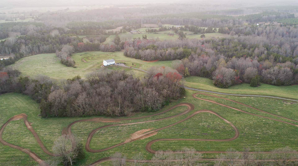 wide angle drone image of throttle therapy atv trails via website